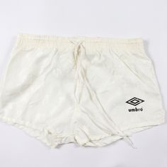 Vintage 80s Umbro Nylon Soccer Shorts Soccer Shorts Brand New The Size Is Youth Medium Measurements Are: 2 Inch Inseam 11 Inch Waist Lying Flat 10 Inch Overall Length White Nylon Check Out My Other Items For Sale In My Store! Box5 White 90s Style Shorts For Summer, White 90s Style Summer Shorts, Retro White Bottoms For Streetwear, Vintage White Bottoms For Summer, Vintage White Summer Bottoms, Retro White Short Bottoms, Vintage White Bottoms For Streetwear, Vintage Style White Bottoms For Streetwear, Vintage White Streetwear Bottoms