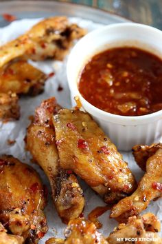 chicken wings with sauce on the side