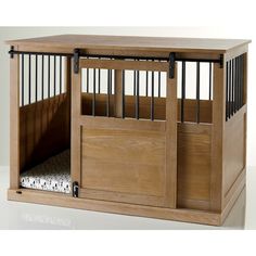 a wooden dog crate with the name jefferson written on it's side and door open