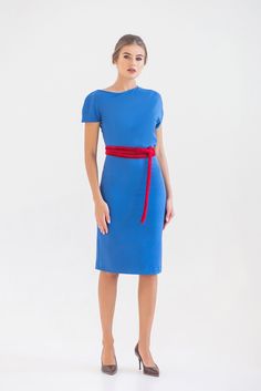 "A beautiful cobalt blue dress is featuring an asymmetrical design, pencil silhouette, and a midi length. - fitted pencil silhouette - asymmetrical blouson bodice - short cap sleeves - midi (knee length) skirt - concealed side seam closure - velvet belt included (you may choose red or black) Fiber: 55% viscose, 40% polyester, 5% elastane Color: cobalt blue For size S: length- 40,5\" (101 cm) Our model wears size S (US 8) and is 171cm/5'6\" tall. You may feel free choosing the size. Just send us Elegant Royal Blue Bodycon Dress For Summer, Blue Bodycon Dress For Summer Formal Events, Fitted Royal Blue Bodycon Dress, Blue Midi-length Evening Bodycon Dress, Fitted Royal Blue Knee-length Dress, Royal Blue Short Sleeve Midi Dress For Party, Blue Midi Length Bodycon Evening Dress, Blue Fitted Asymmetrical Midi Dress, Royal Blue Short Sleeve Midi Party Dress