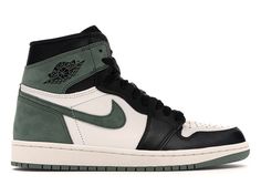 the nike air jordan 1 mid is available in black, white and green