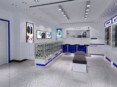 the interior of a retail store with blue and white accents