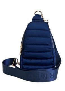 a small blue backpack on a strap