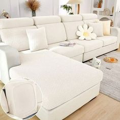 a living room filled with white furniture on top of a hard wood floored floor