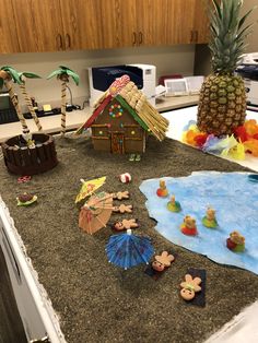 a kitchen counter with decorations and pineapples on it