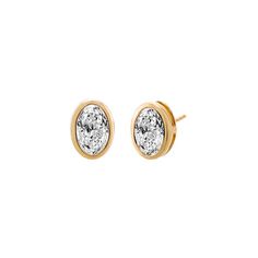 Introducing the Adina Eden Lab Grown Diamond Oval Bezel Stud Earrings, a stunning and elegant addition to your jewelry collection. Crafted from a blend of 14K gold and 14K white gold, these earrings feature a single oval brilliant-cut lab-grown diamond in each stud. With a color grade of G and clarity of VS1, these diamonds offer exceptional brilliance and purity. Available in five carat sizes—0.25 CT, 0.5 CT, 1 CT, 1.5 CT, and 2 CT—these earrings cater to various style preferences. Secured with Carat Sizes, Diamond Anklet, Bold Rings, Gold Cocktail Ring, Anklet Bracelet, Charm Bangle, Bezel Diamond, Diamond Bracelets, Oval Diamond