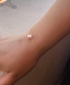 Meticulously designed by hand, every Renn New York piece is a work of art. The name “Amara” comes from the root word “Amar,” meaning “to love,” and in other languages it means “to make a home.” Bring the Amara Pearl Bracelet home. Featuring a lustrous pink pearl, the Amara Pearl Bracelet is balanced by a clasp detail for easy access. Product Details Genuine freshwater pearl and 14K gold fill chain. Made in New York City. Care Instructions Make sure cosmetics, perfumes, lotions, and oils are comp Other Languages, Rings For Girls, Travel Beauty, Handbag Shoes, Pink Pearl, Small Accessories, Fine Jewellery Earrings, Bridesmaid Jewelry, Pearl Bracelet