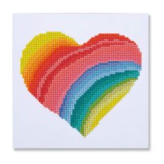 a cross stitch rainbow heart on a white background