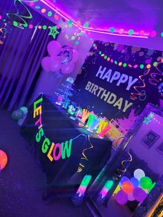 a birthday party with balloons and decorations