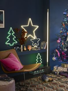 a brightly lit christmas tree in a living room