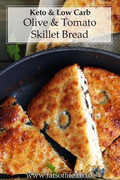 keto and low carb olive and tomato skillet bread in a cast iron pan