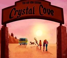 two people and a dog are walking under a sign that says crystal cove