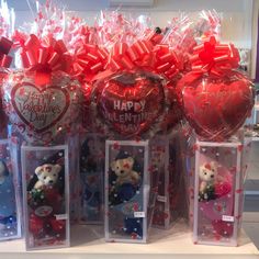 valentine's day teddy bears in clear boxes with red bows and hearts on them