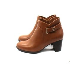 Sleek and sophisticated, the Artemyss booties by Giani Bernini are a style-savvy pick with both dressy and casual looks. 2-1/2" block heel Round-toe booties with inner ankle zipper closure Logo hardware and strap Memory foam for added comfort; slip-resistant sole for added tractio Manmade upper; fabric lining; manmade sole Imported Medium Width Low Heel Booties For Work, Elegant Low Heel Booties With Stacked Heel, Elegant Booties With Stacked Low Heel, Workwear Booties With Low Heel And Medium Width, Round Toe Booties For Office In Fall, Elegant Ankle-high Booties With Stacked Heel, Elegant Booties With Stacked Heel, Fall Round Toe Booties For Office, Fall Office Booties With Round Toe