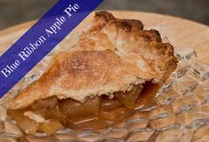 a piece of pie sitting on top of a glass plate next to a blue marker