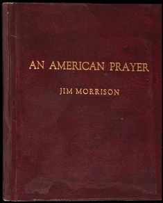 an american prayer book with gold lettering on the front and back cover, in red