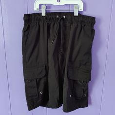 Washed Never Worn Swim Short With Velcro Pockets And Drawstring To Make Them Tighter. Black Swim Trunks With Built-in Shorts For Outdoor Activities, Black Short Swim Trunks For Outdoor Activities, Black Cotton Cargo Shorts For Outdoor Activities, Black Cargo Shorts With Side Pockets For Sports, Black Cargo Shorts With Pockets For Sports, Sporty Black Cargo Shorts, Black Swim Trunks With Pockets For Outdoor Activities, Black Swim Trunks With Built-in Shorts For Outdoor, Black Swim Trunks With Pockets For Outdoor