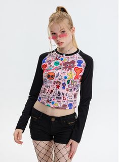 Behold a t-shirt that is bursting with color and creativity, designed for those who dare to stand out. This piece is a collage of vibrancy, featuring a myriad of playful characters and bold words that embody a spirit of fun and freedom. The long pink sleeves contrast with the animated central panel, making for a unique garment that's as expressive as it is comfortable. Perfect for adding a splash of joy to any outfit, it's the ideal choice for the adventurous soul looking to make a statement.Fab Playful Long Sleeve T-shirt With Graphic Print, Spring Fun Graphic T-shirt, Casual Multicolor Cartoon Print Tops, Cotton Multicolor Cartoon Print Tops, Cotton Tops With Multicolor Cartoon Print, Cotton Tops With Cartoon Print In Multicolor, Fun Long Sleeve T-shirt With Screen Print, Fun Multicolor Cartoon Print Tops, Casual Multicolor Tops With Funny Print