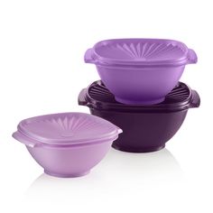 three purple bowls and one black bowl are stacked on top of each other in the same pattern