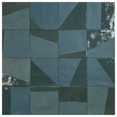 an abstract tile design in shades of blue and green