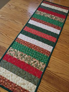 a table runner made from strips of fabric