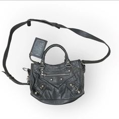 Black City Bag With Silver Hardware! Designer Medium Satchel With Removable Pouch, Designer Medium Shoulder Bag With Removable Pouch, Designer Satchel With Branded Hardware For Everyday Use, Designer Crossbody Satchel With Gunmetal Hardware, Designer Medium Shoulder Bag For Everyday Use, Luxury Medium Bag With Adjustable Strap, Luxury Black Medium Bags, Luxury Medium Black Bags, Medium Luxury Black Bags