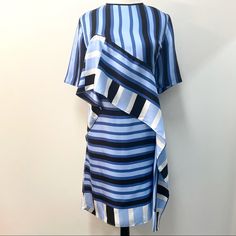 Nwt Diane Von Furstenberg Ruffle Front Mini Dress Saxon Stripe Powder 100% Silk Size 14 Note- Last Photo Shows A Very Slight Fade Mark, Almost Unnoticeable Blue Ruffled Mini Dress For Work, Blue Ruffle Mini Dress For Work, Frayed Dress, Dvf Diane Von Furstenberg, Jersey Wrap Dress, Silk Wrap Dresses, 2 Piece Skirt Set, Diane Von Furstenberg Dress, Aqua Dress