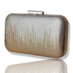 Finish your evening ensemble with this elegant clutch, designed in a gorgeous, with golden and silver rhinestones and crystal embellishment across the front and back. Versatile and striking bag can be carried in hand or with the removable metal chain strap. Clutch is an essential for any formal party wedding, etc. Perfect gift for bride, wife, mother, girlfriend, ladies. Evening bag, clutch bag, Evening Clutch Bag, Evening Clutch Bag  Elegant diamanté Crystal evening clutch bag, with carrying ch Elegant Clutch Bag For Dinner, Glamorous Rectangular Evening Bag For Dinner, Rectangular Rhinestone Evening Bag, Evening Pouch Bag With Rhinestones, Evening Handheld Clutch With Rhinestones, Rhinestone Embellished Evening Pouch Bag, Elegant Rectangular Clutch For Dinner, Handheld Rhinestone Clutch For Evening, Silver Evening Bag With Rectangular Case Shape