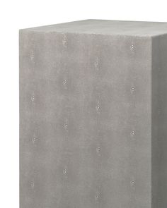 a concrete block is shown with dots on the top and bottom part, as if it were made out of cement