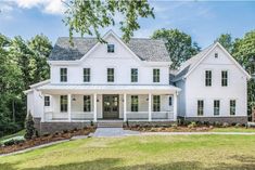 a large white house with lots of windows