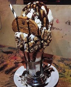 an ice cream sundae with chocolate and marshmallows