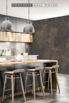 an image of a modern kitchen setting with stools and counter tops in the center