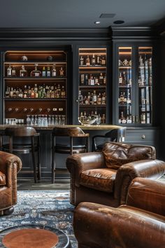 a room with leather furniture and shelves filled with bottles