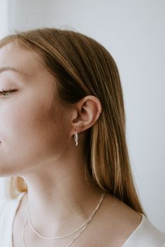 Elevate your everyday look with these stunning 20mm Sterling Silver Hoops—designed for those who appreciate timeless elegance and understated style. These classic hoops add just the right amount of shine without being too bold, making them perfect for both day-to-day wear and special occasions. The Details - Material: 925 Stamped Sterling Silver, known for its durability and lustrous shine that lasts - Hypoallergenic: Nickel and lead-free, gentle on sensitive ears - Size: 20mm, the perfect mediu Everyday Nickel-free Wrap Earrings, Hypoallergenic Threader Earrings For Everyday Wear, Hypoallergenic Everyday Threader Earrings, Everyday Silver Wrap Earrings, Simple Hypoallergenic Cartilage Earrings, Sterling Silver Everyday Threader Earrings, Sterling Silver Threader Earrings For Everyday, Everyday Sterling Silver Threader Earrings, Everyday Silver Wrap Earrings With Ear Wire