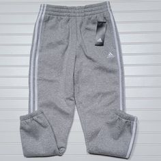 Nwt Adidas Fleece Lined Joggers/Sweatpants, Size L (14), Heather Gray With White Stripes, Has Pockets, Soft Fleece Lined, Elastic Cuffs. Adidas Cotton Gym Pants, Adidas Athleisure Joggers For Loungewear, Adidas Cotton Sweatpants For Gym, Adidas Cotton Joggers For Gym, Adidas Sweatpants With Elastic Waistband For Sports, Adidas Sweatpants For Loungewear, Adidas Sweatpants For Loungewear In Athleisure Style, Adidas Sweatpants For Loungewear, Athleisure Style, Adidas Athleisure Sweatpants For Loungewear