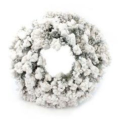 a white wreath with snow on it