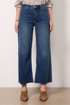 Round out your denim collection with the must-have Meg jean by Kut From The Kloth. This wide leg silhouette is finished in a versatile dark blue wash with a zipper fly closure and ankle-length raw hems. The soft comfort-stretch denim will move with you from day to night. | KUT FROM THE KLOTH Women's Meg Wide Leg Jeans, Size 2, Blue