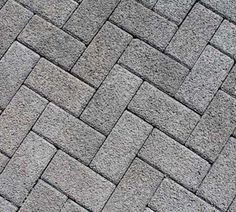 an image of a brick sidewalk that is made out of concrete blocks and has no bricks on it