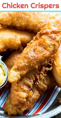 fried chicken crispers on a plate with dipping sauce