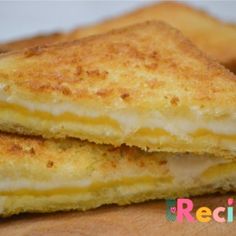 two grilled cheese sandwiches stacked on top of each other with the words recipe written below