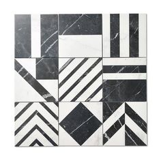 black and white marble tiles with geometric designs