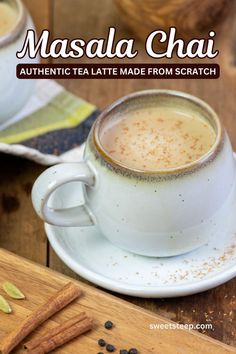 Masala chai in a tea cup with cinnamon sprinkled on top sitting next to a cutting board with whole spices like cinnamon, cardamom and black peppercorns. Chai At Home, Spiced Milk, Chai Tea Latte Starbucks, Masala Chai Recipe, Tea And Milk, Chai Latte Recipe, Milk Tea Recipes