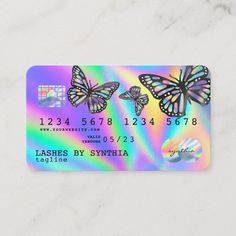 a holographic credit card with two butterflies on the front and bottom, which is multicolored