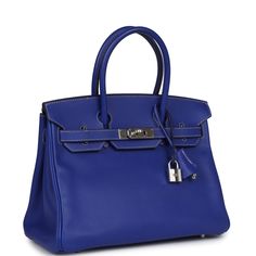 This Candy Birkin is in Bleu Electrique epsom leather with palladium hardware and has contrast stitching, a front toggle closure, a clochette with lock and two keys, and double rolled handles.The interior is lined with Bleu Mykonos chevre and has one zip pocket with an Hermes engraved zipper pull and an open pocket on the opposite side.Collection: O SquareOrigin: FranceCondition: Preowned; Excellent - This bag retains its shape. There's no plastic on the hardware and there's moderate scratching with some discoloration to the hardware. The exterior leather has some wear around the corners of the bag and some minor discoloration to the exterior stitching. The interior leather is clean but has two small press markings to the interior base with no other signs of wear.Accompanied by: Hermes dus Blue Leather Bag With Lock, Luxury Blue Bag With Hasp Closure, Blue Formal Bag With Turn-lock Closure, Blue Bags With Lock For Formal Occasions, Blue Leather Bag With Turn-lock Closure, Timeless Blue Bags With Silver-tone Hardware, Blue Electric, Birkin 30, Hermes Birkin 25