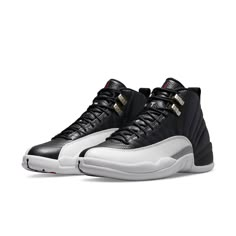 The Air Jordan 12 Retro "Playoff" is back for 2022, bringing back the mid-top design that Michael Jordan wore during his 1997 championship campaign. This edition of the Air Jordan 12 features a black leather upper with radiating stitched lines, lizard-textured overlays in a white finish, metallic silver eyelets, and crimson accents on the Jumpman-embroidered tongue and webbing heel loop. Whether you're lacing up to hit the hardwood or just wanting to rock a classic style, the Air Jordan 12 Retro "Playoff" is a must-have in your sneaker rotation. These shoes are perfect for athletes who want to be able to move around with ease and agility. With the full-length Zoom Air cushioning, you'll be able to jump high and run fast with no problem at all. And with the carbon fiber shank plate, you'll Sporty Jordan Shoes For Sports Events, High-top Basketball Shoes With Padded Tongue, High-top Basketball Shoes With Padded Tongue For Sports, Sporty Basketball Shoes With Padded Tongue, Black High-top Sneakers With Padded Tongue For Sports, Jordan Model, Air Jordan 12, Air Jordan 12 Retro, Jordan 12 Retro