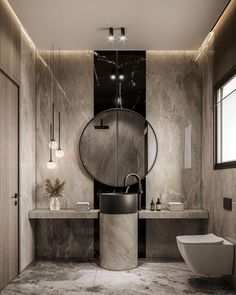 a bathroom with two sinks and a large mirror in the wall next to each other