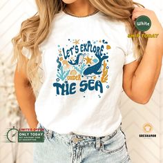 🌟 Final Call: Christmas Orders End Dec 7! 🎄 🔥 Use code SAVEMORE at checkout for 30% OFF with 2+ item order. Don't miss out! Looking for the perfect gift for your favorite teacher? Look no further than our Let's Explore Under The Sea Shirt! This funny and cute back to school shirt is the perfect way to show your appreciation for all the hard work and dedication that teachers put in every day. With its custom design featuring vibrant underwater sea life, this teacher ocean shirt is sure to be a hit with any ocean lover or kindergarten teacher. So why wait? Order your very own Let's Explore Under The Sea Shirt today and give your favorite teacher a gift they'll never forget! 📏 SHIRT MATERIAL * Super soft, light and comfortable, with the right amount of stretchy makes these short sleeve t- Ocean Kindergarten, Girl Scout Shirts, Animal Outfit, Underwater Sea Life, Ocean Shirt, Vbs 2024, Underwater Sea, Class Shirt, Under The Sea Theme