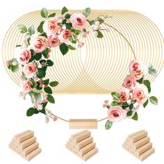 an arrangement of pink flowers and greenery on a gold wire sculpture with wooden blocks