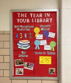 a bulletin board with the year in your library written on it next to a tiled wall