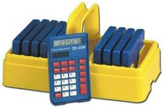 two calculators sitting next to each other on top of a yellow tray with blue and red numbers